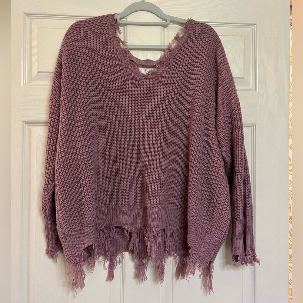 Cute sweater! Size M but could be XL